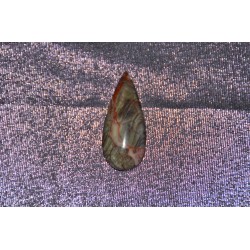 Гоё ховорхон сайхан, сонин хээ хуартай улаан өнгийн гартаам чулуун шигтгээ.  